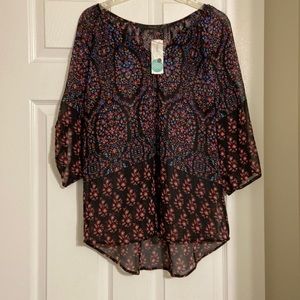 Fun 2 fun. Mixed print blouse. Size L. Never worn.